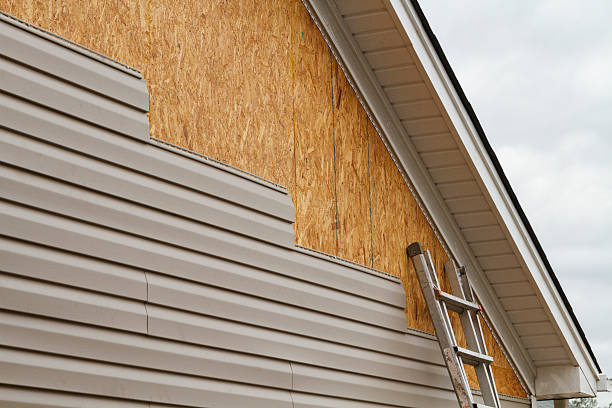 Professional Storm Damage Siding Repair technician working in Kennedyville, MD